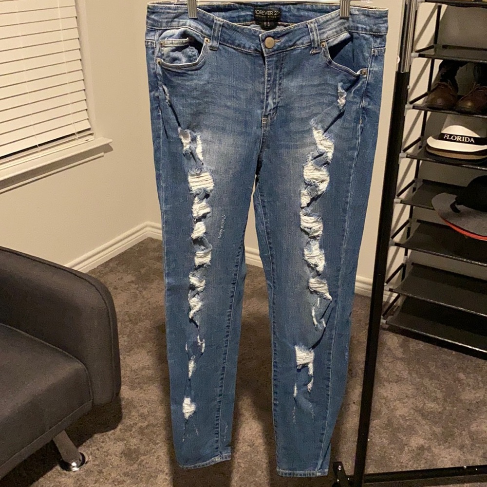 Medium blue distressed skinny jeans from Forever21